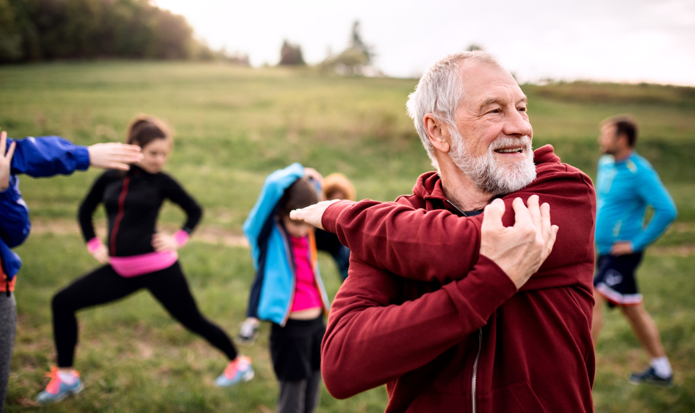 man happily exercising after pellet hormone therapy