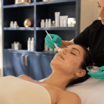 provider applying a customized facial mask during a relaxing skincare treatment.