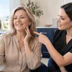 2026_10_mirabilemd.com_img_facial_rejuvenation_consultation_v1 mirabile md - mature woman reviewing her skin with an aesthetic provider